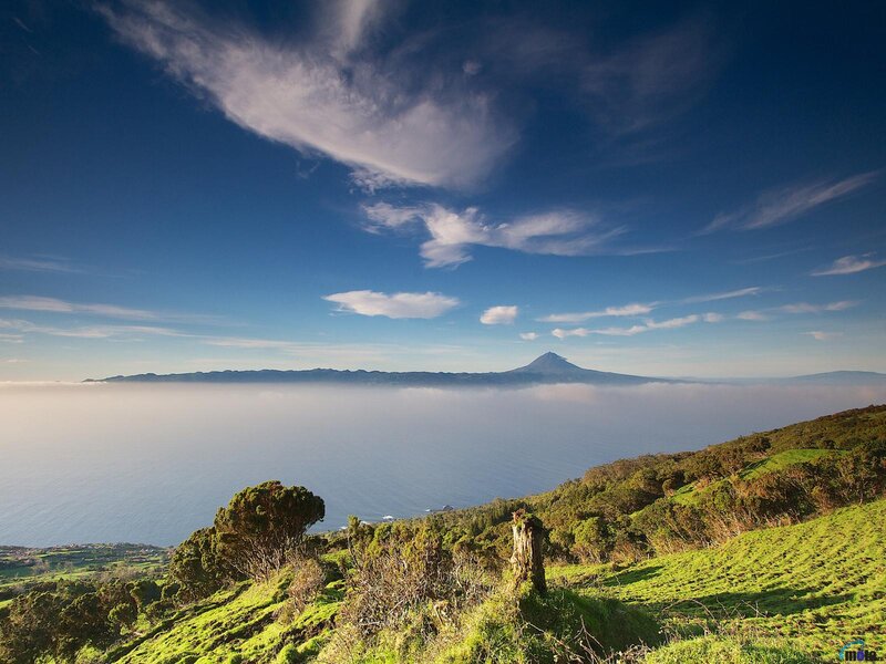 Volcanic Island in Sea — Blue