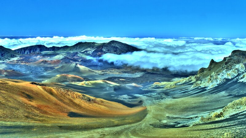 volcanic landscape above clouds