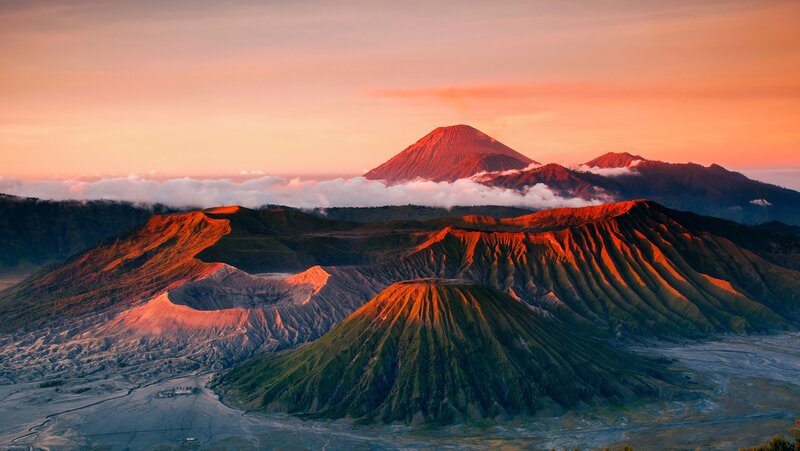 Volcanic Landscape at Sunrise — Orange, Dramatic, Photograph, Mountains, Clouds, Craters