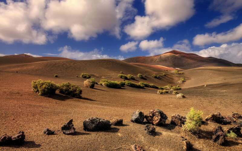 Volcanic landscape under blue sky