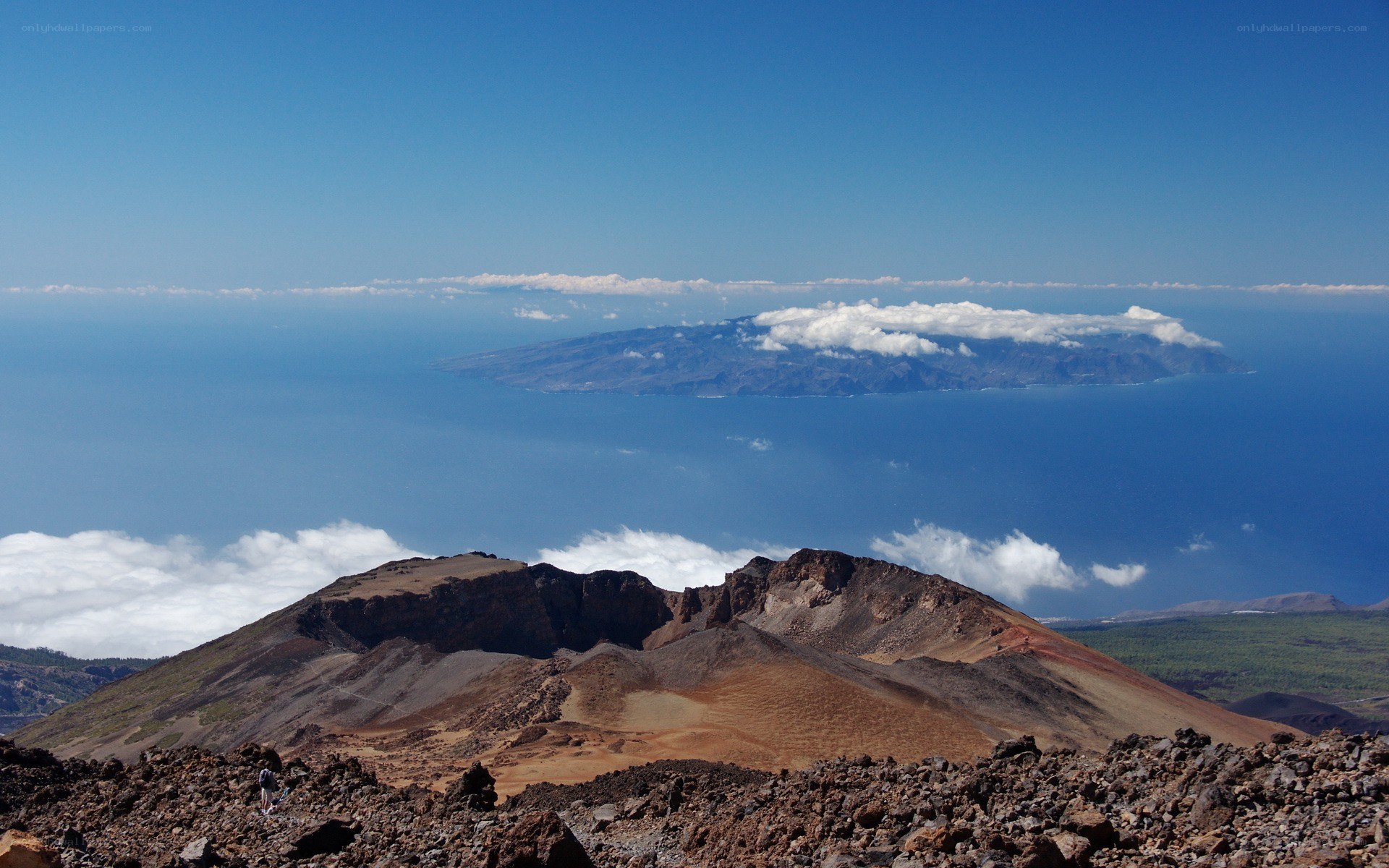 Volcanic landscape with distant island
