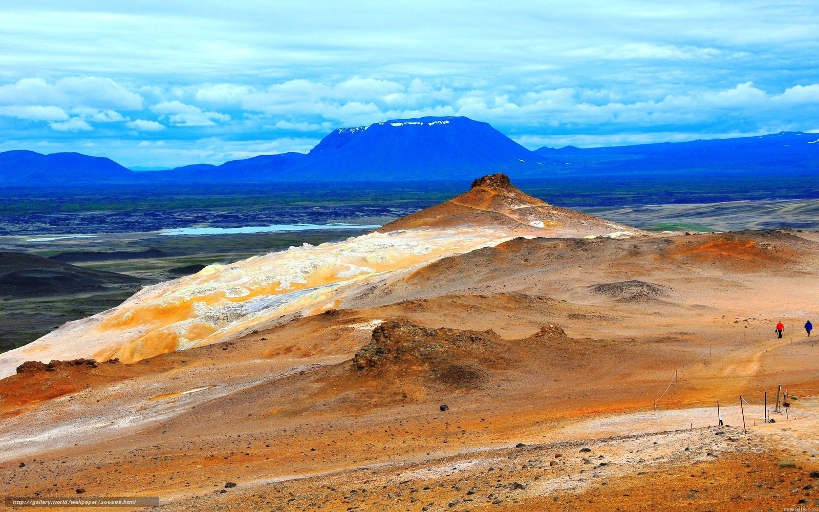 volcanic landscape with hikers