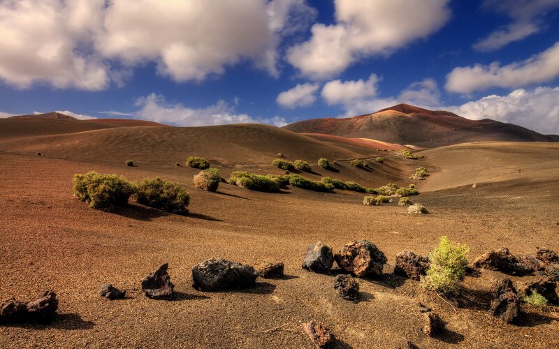 Volcanic landscape with red hills