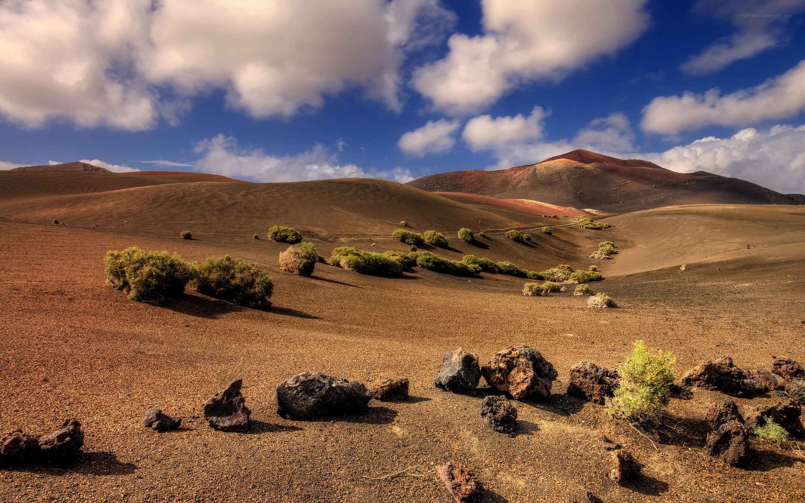 Volcanic landscape with red hills