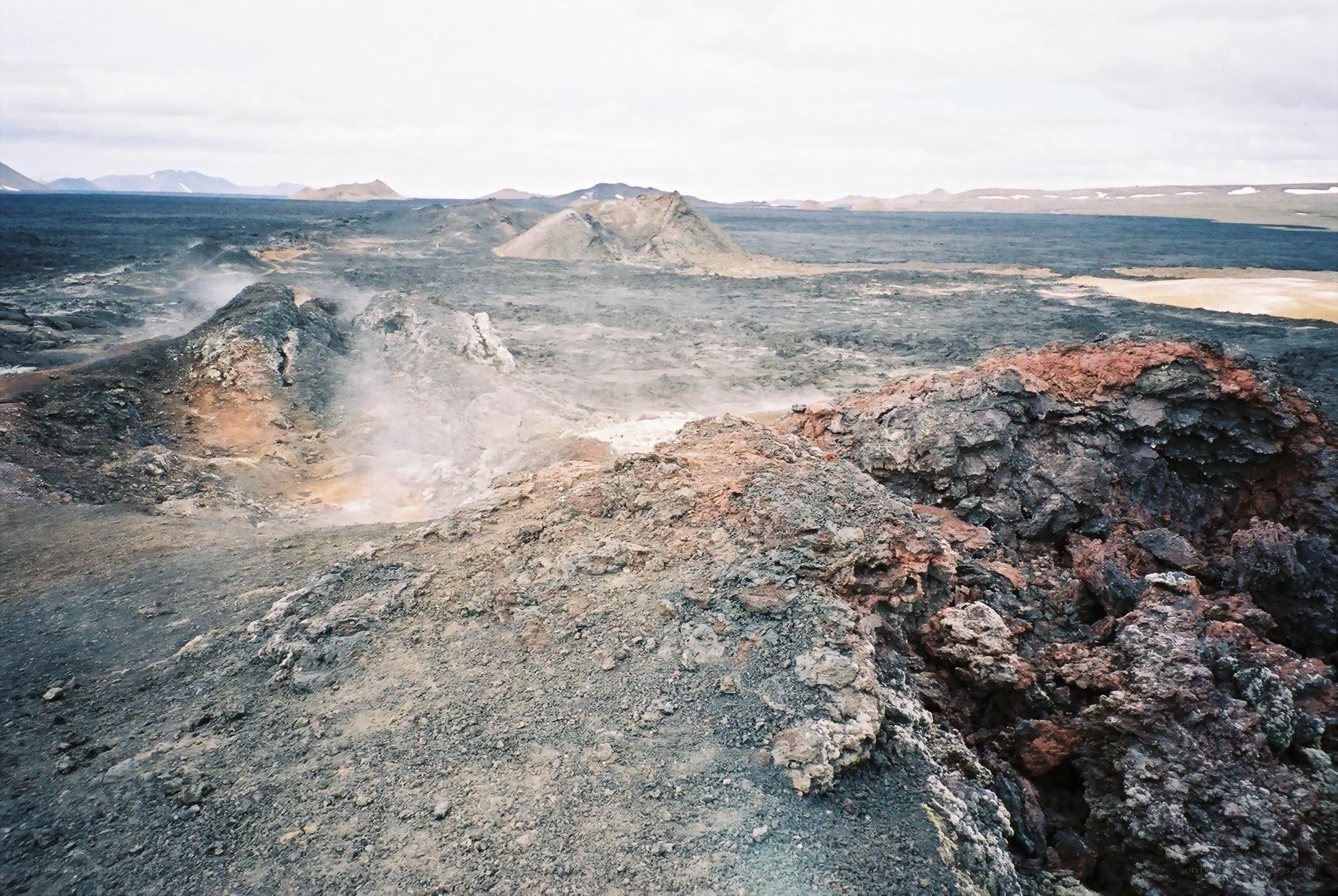 volcanic landscape with steam vents