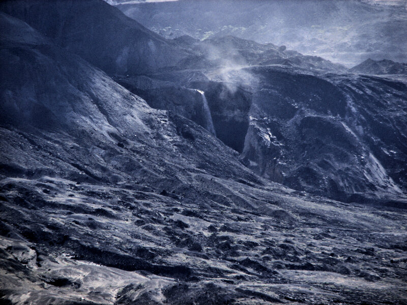 Volcanic Landscape with Waterfall