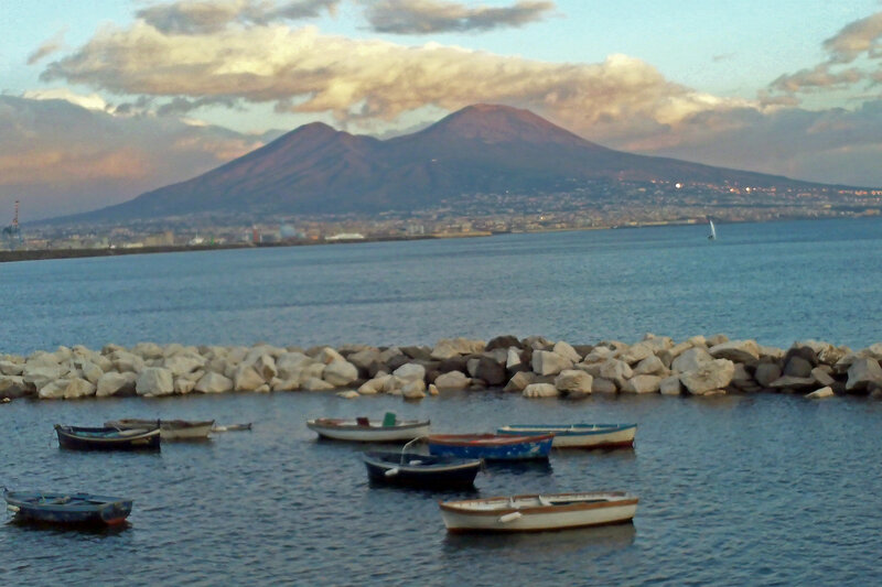 Volcanic Mountain and Boats