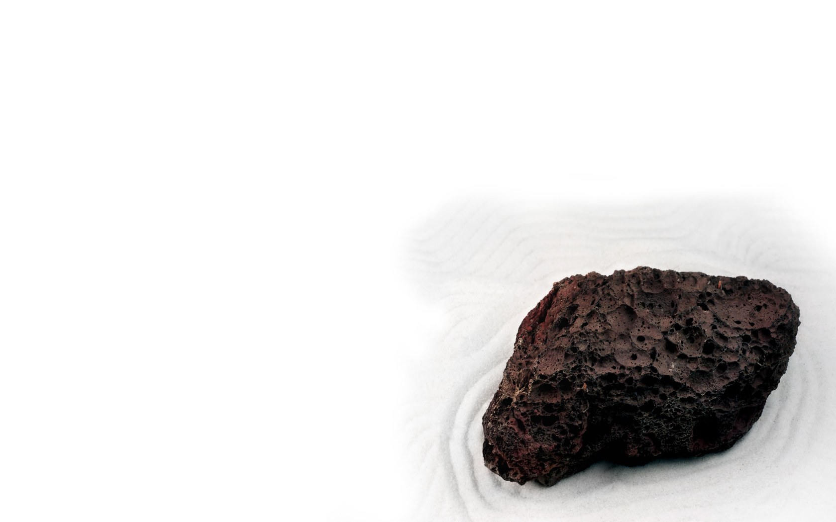 volcanic rock on sand