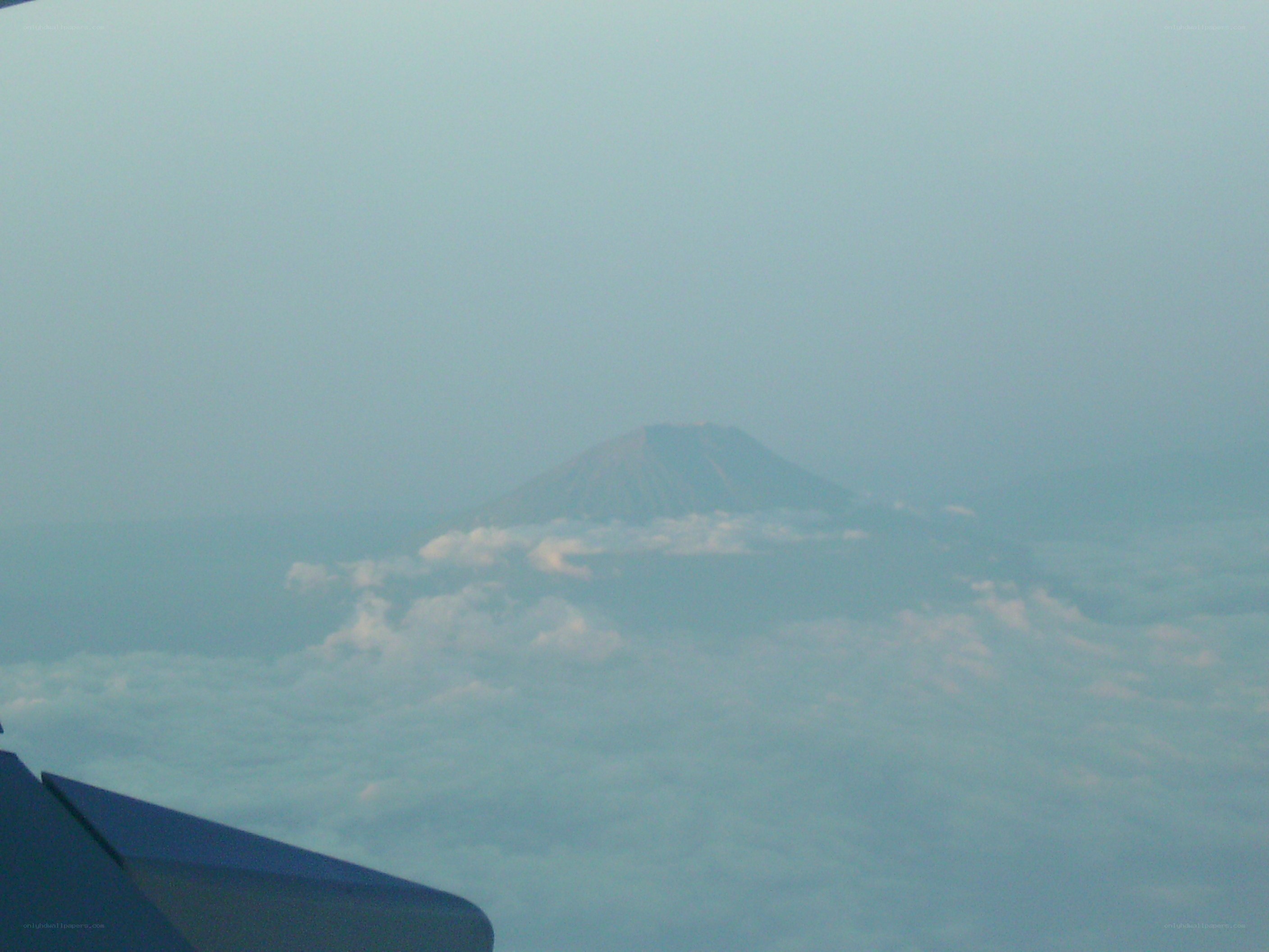 Volcano above the clouds