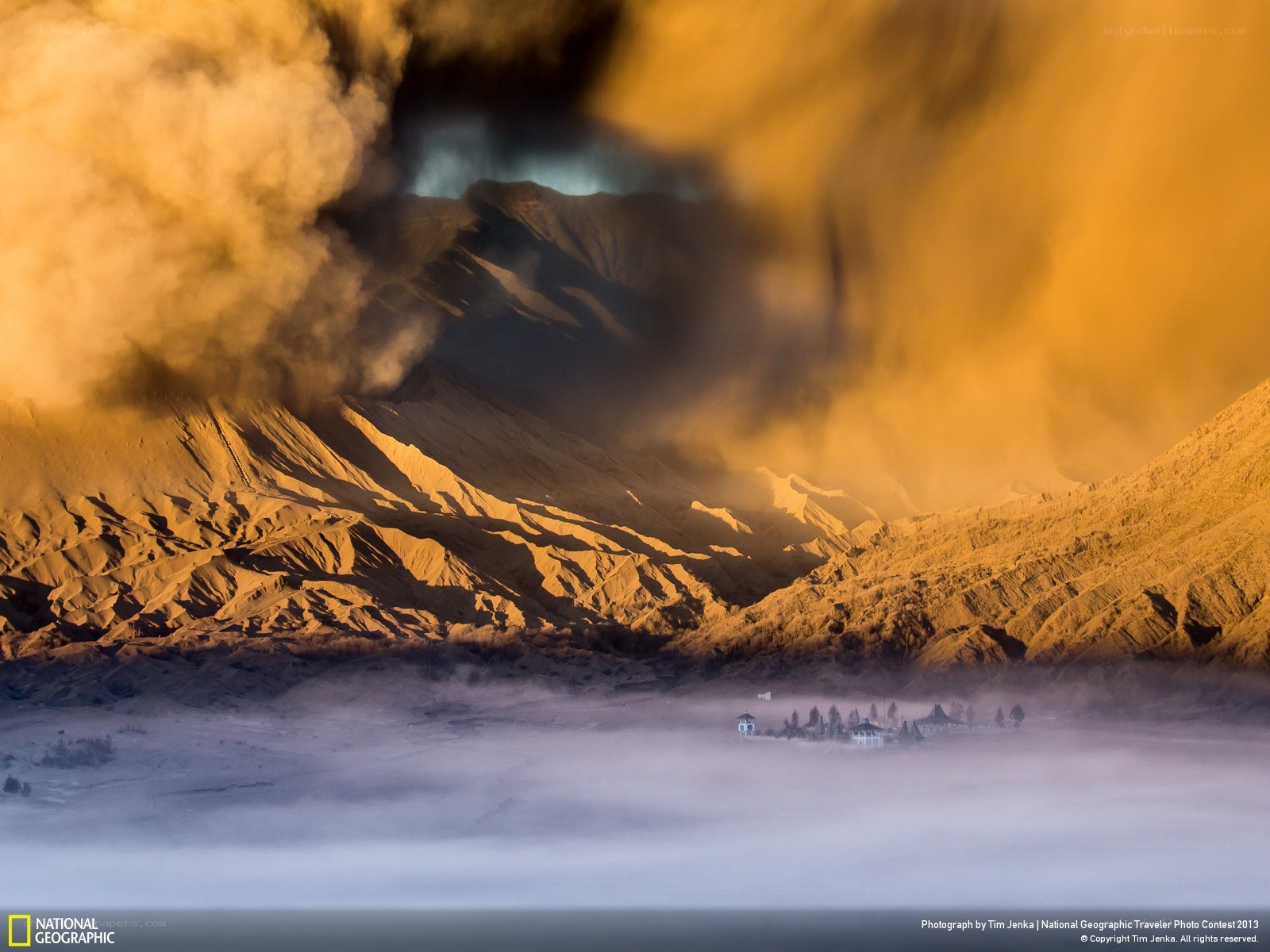 Volcano at sunrise with mist