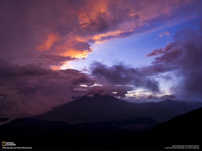 Volcano at sunset with colorful sky