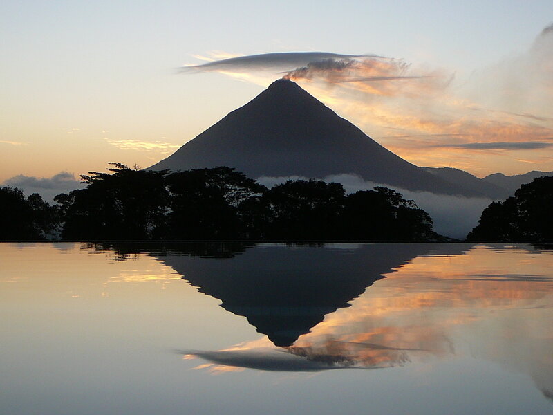 Volcano at sunset with reflection
