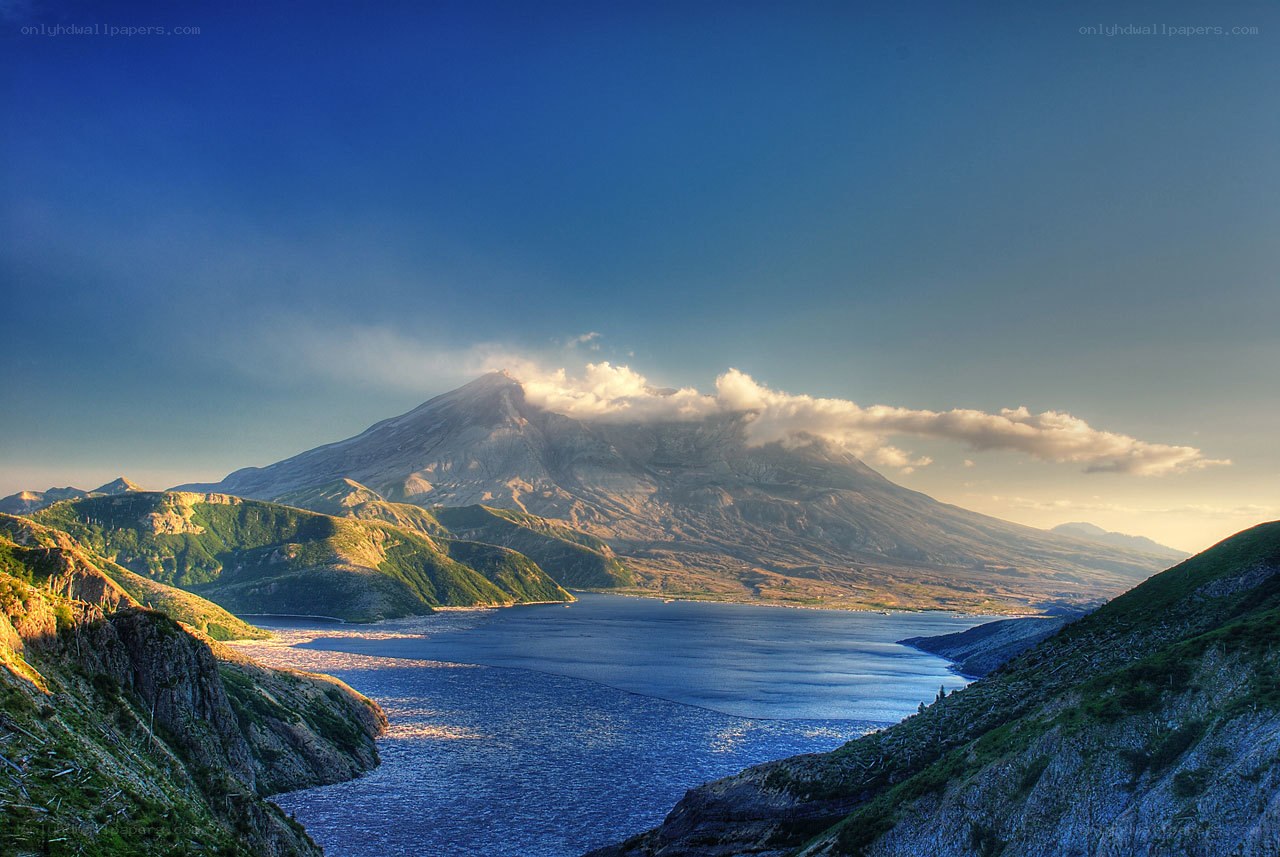 volcano by the sea at sunset