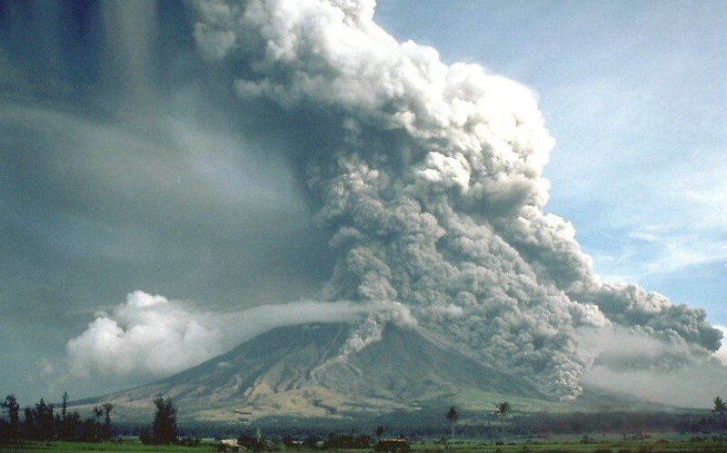 Volcano erupting ash cloud