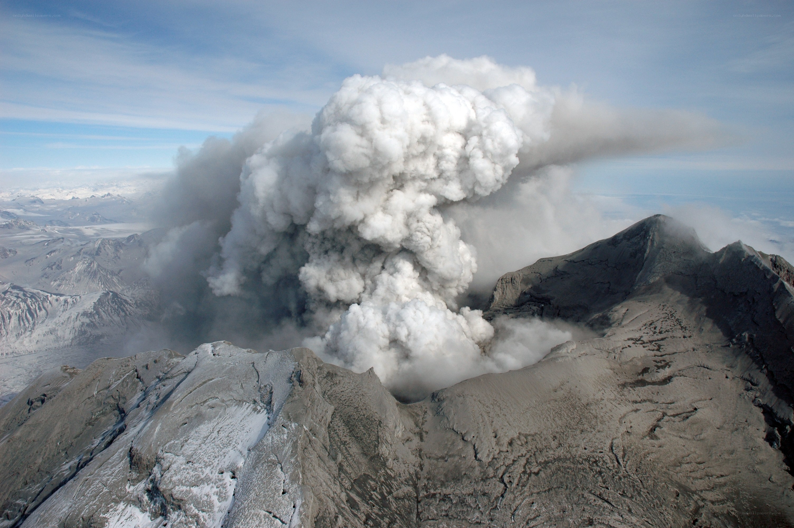 Volcano erupting ash cloud