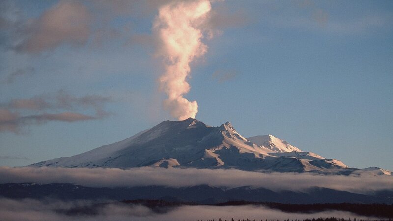 Volcano erupting at dawn