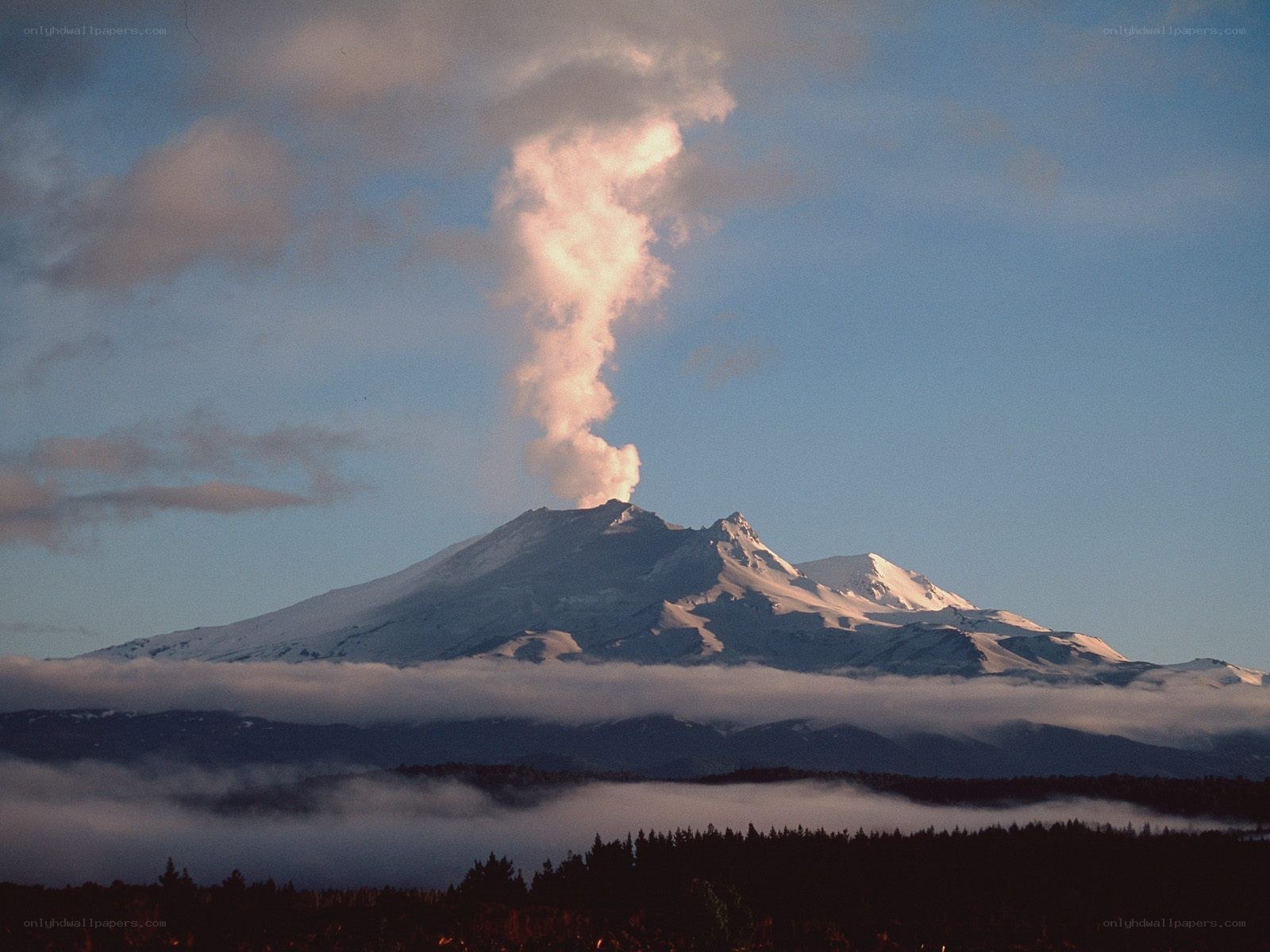 Volcano erupting at dawn