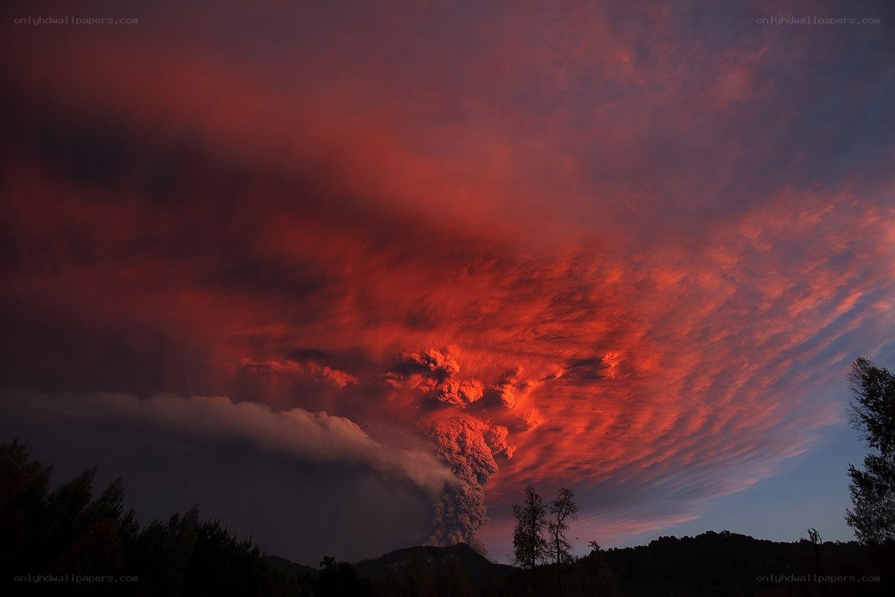 Volcano erupting at dusk