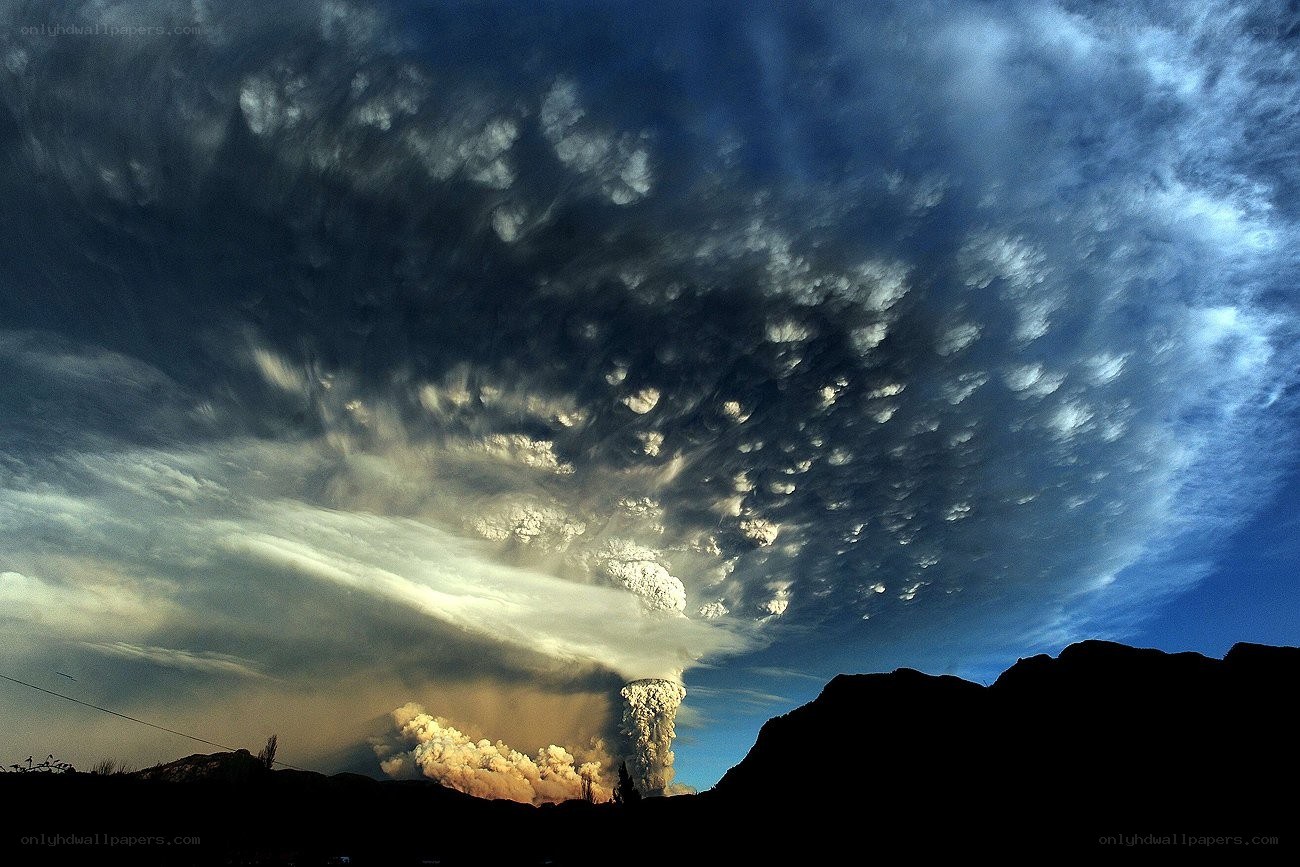 Volcano erupting at dusk