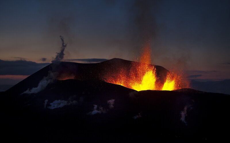Volcano Erupting at Night — Black, Dramatic, Photograph, Lava, Smoke, Mountain, Orange, Yellow