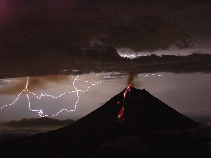 Volcano Erupting at Night — Black, Dramatic, Photograph, Lightning, Lava, Clouds