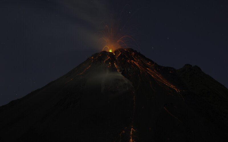 Volcano Erupting at Night — Black