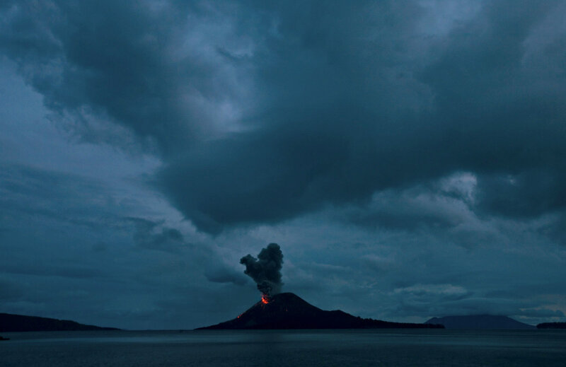 Volcano Erupting at Night — Dark Blue