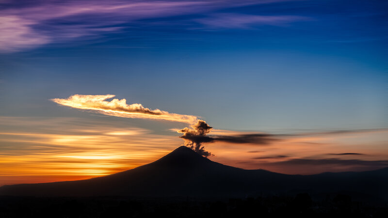 Volcano Erupting at Sunset — Blue, Dramatic