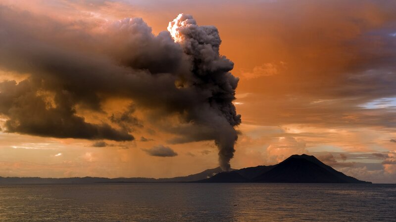 Volcano Erupting at Sunset — Orange, Dramatic, Photograph