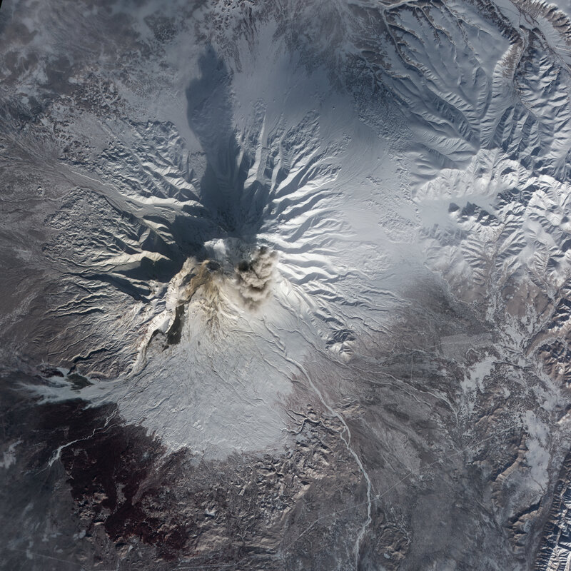 Volcano erupting from space