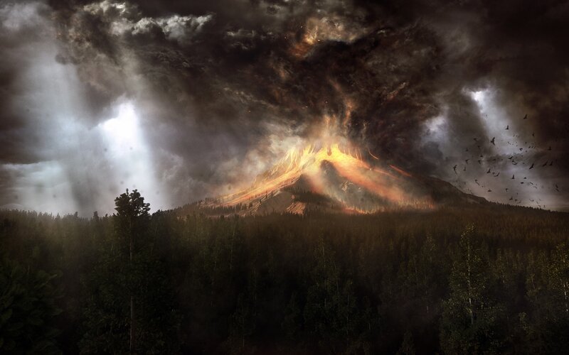 Volcano erupting in forest