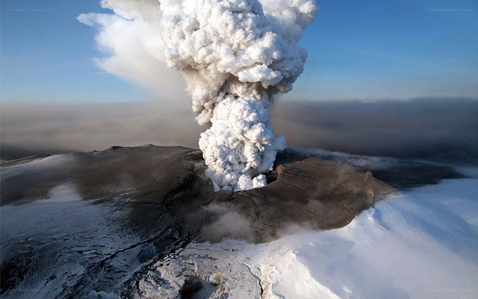 Volcano erupting in snow