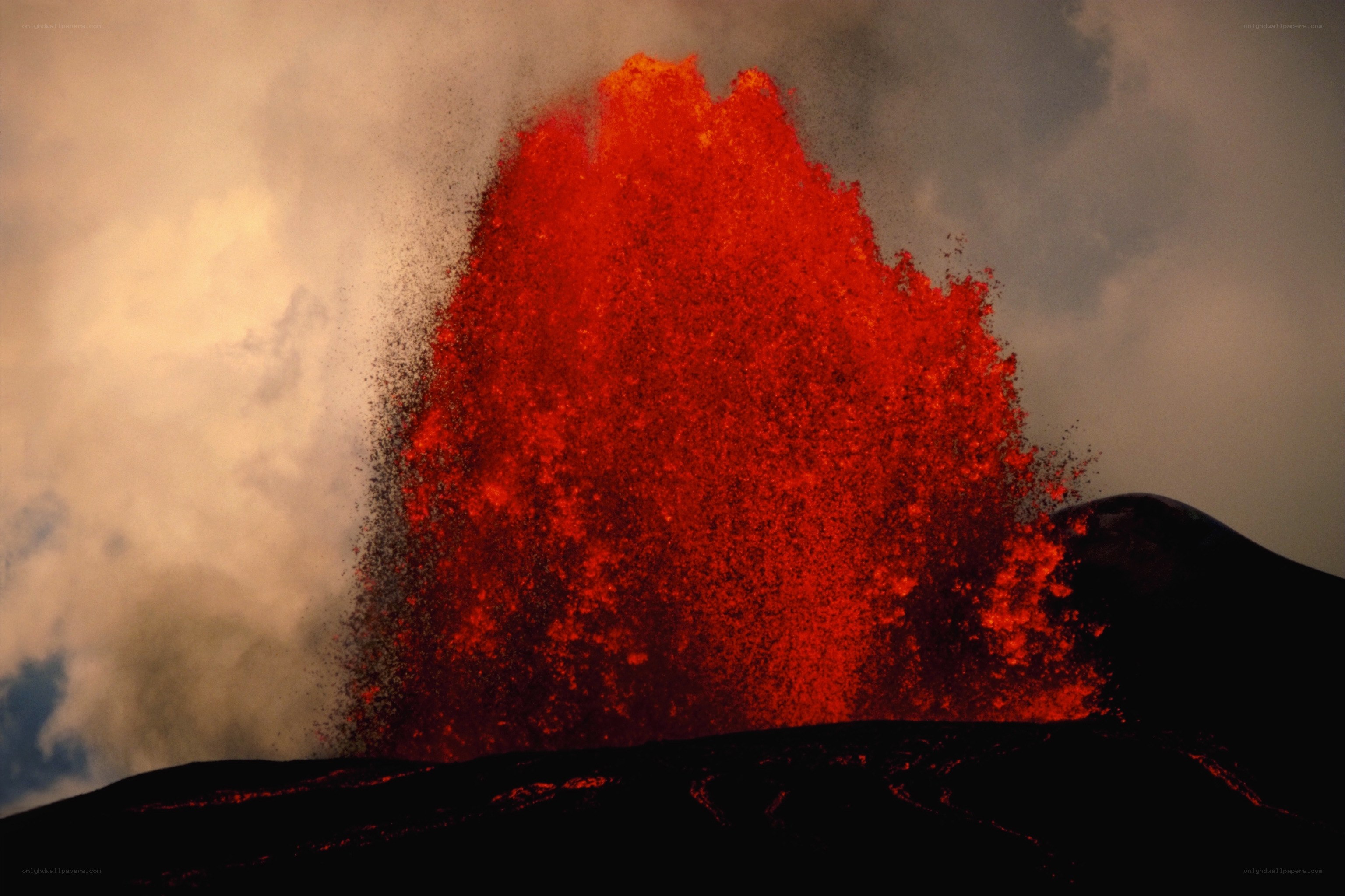 Volcano erupting lava