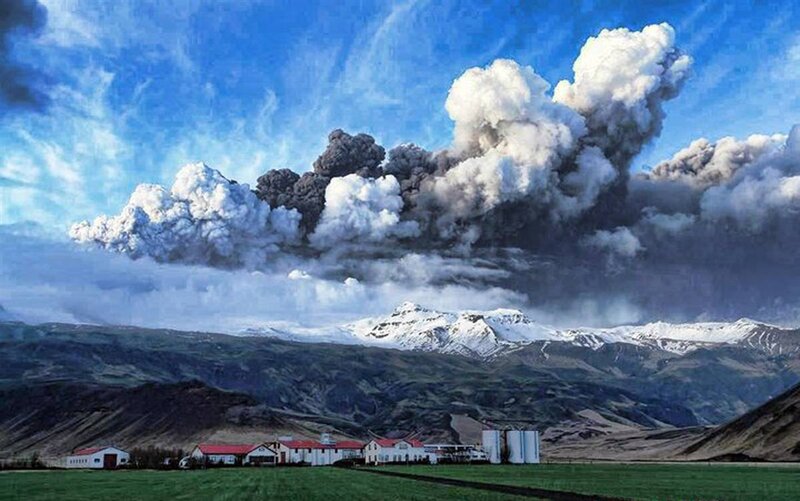 Volcano erupting near farm