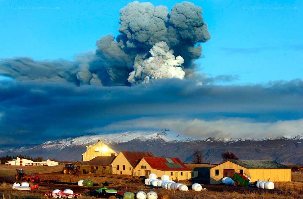 Volcano erupting near farm