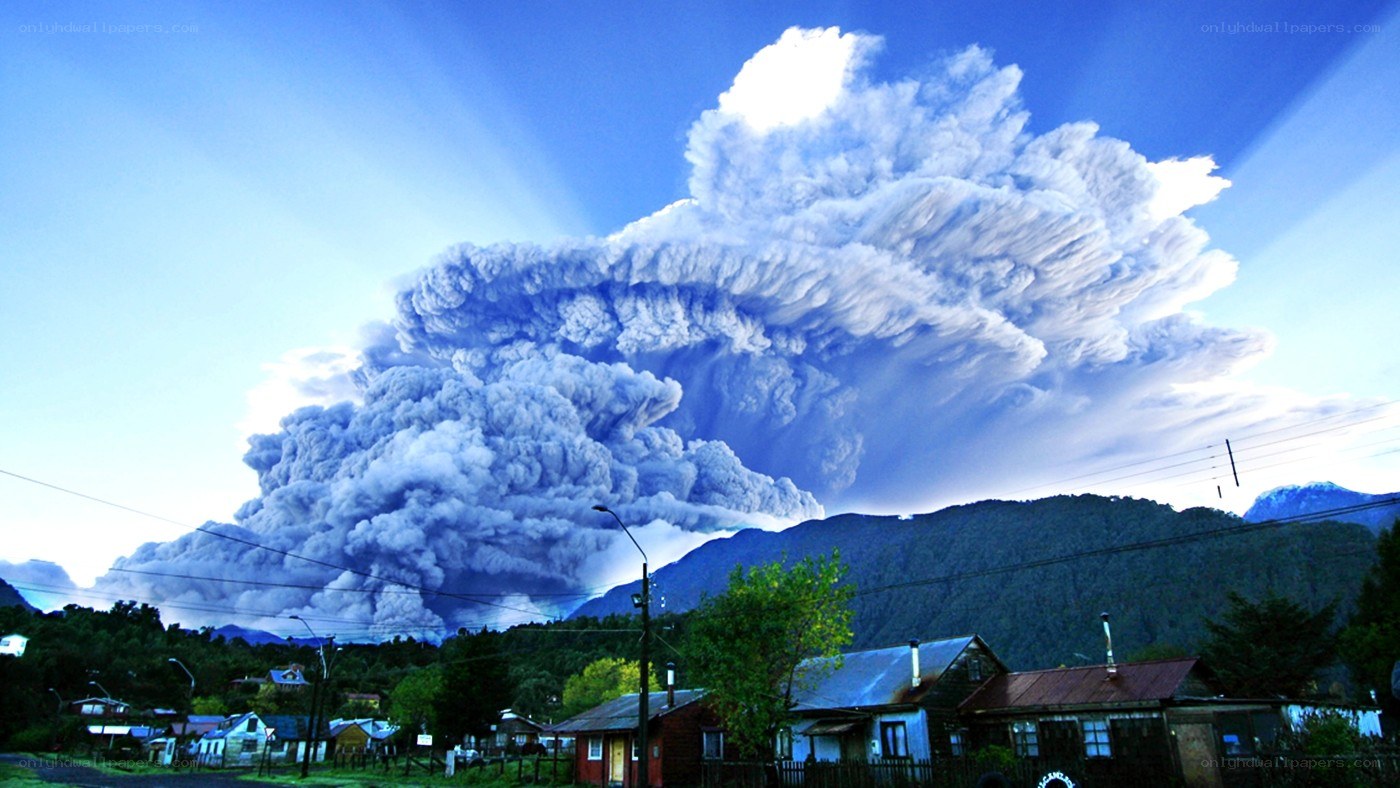 Volcano erupting near town