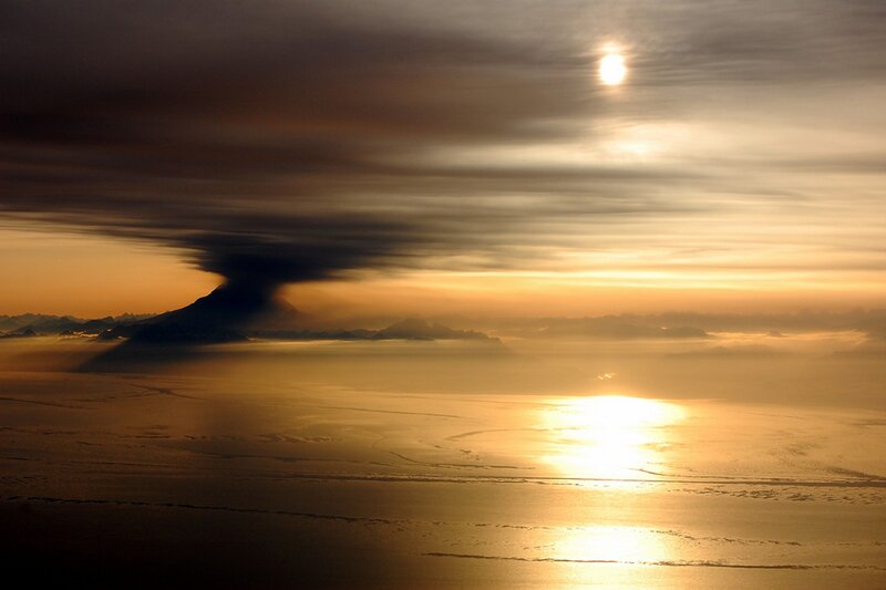 Volcano Erupting over Sea — Gold