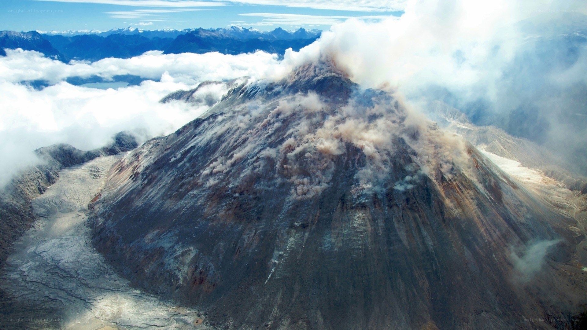 Volcano erupting with ash plume
