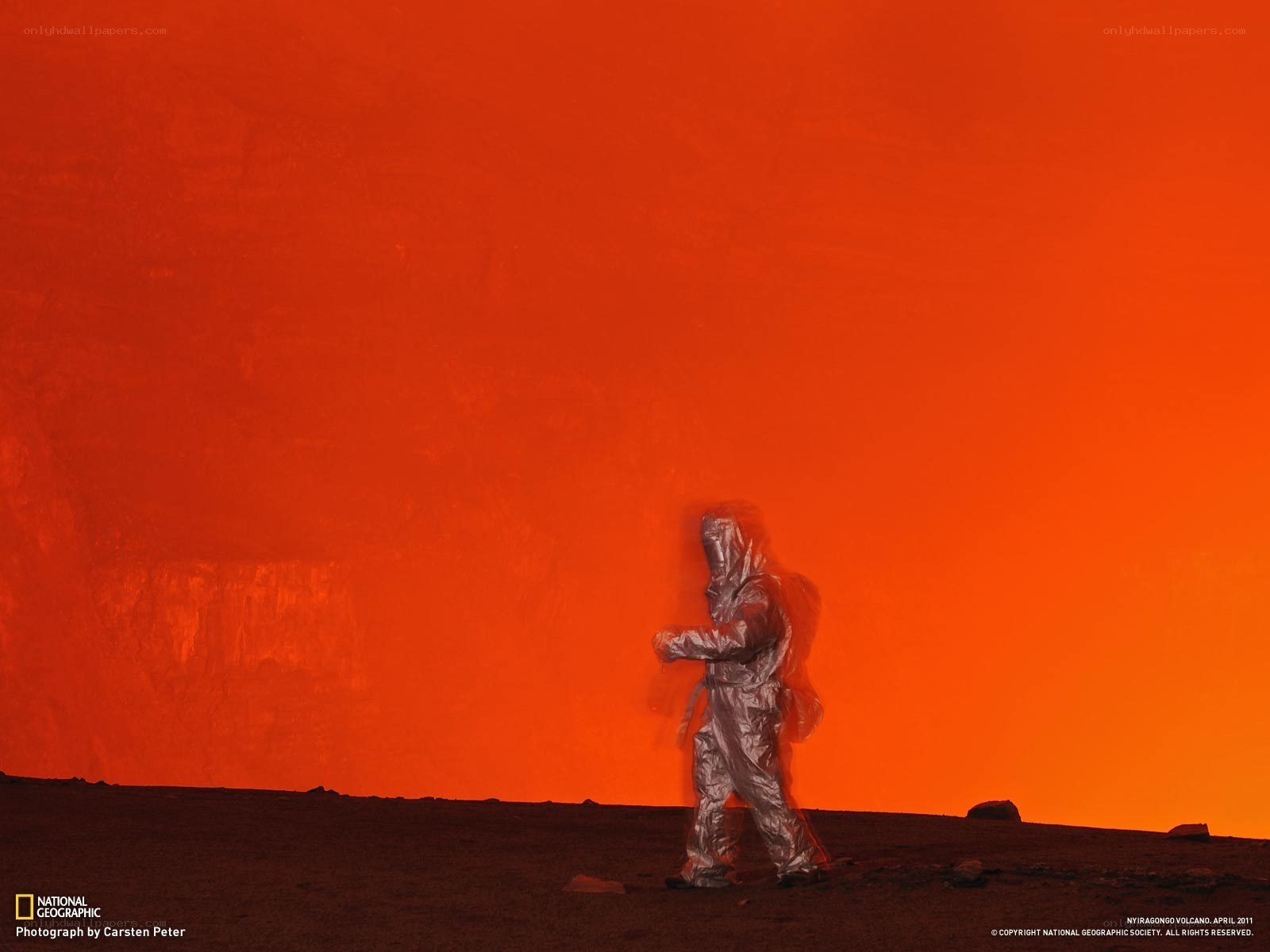 Volcano explorer in protective suit
