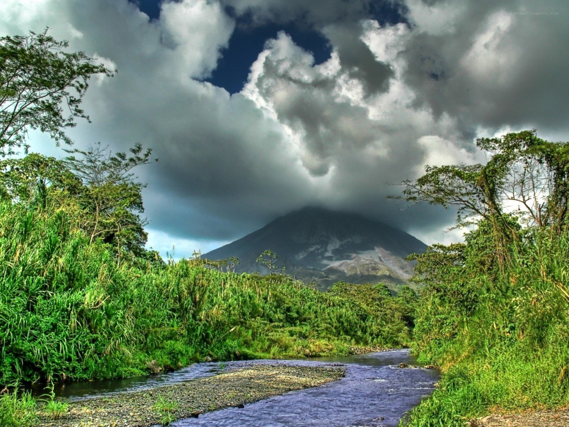 Volcano in lush green landscape