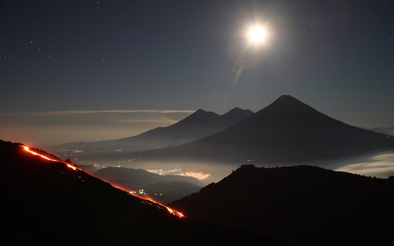 Volcano lava flow at night