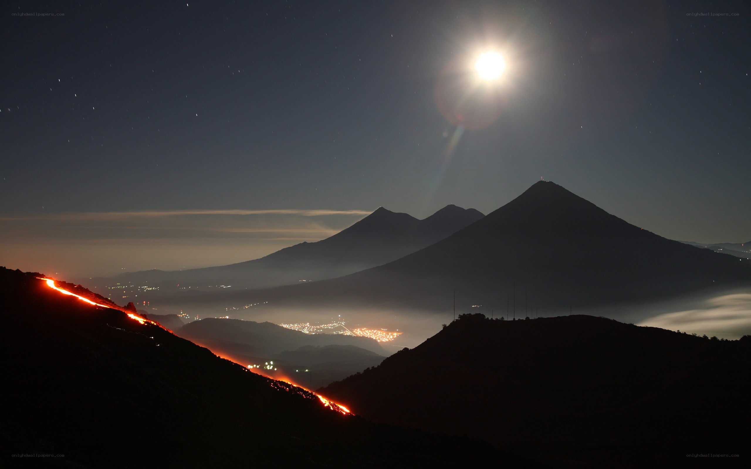 Volcano lava flow at night
