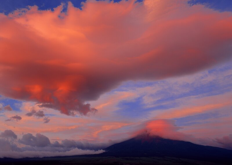 Volcano under sunset clouds