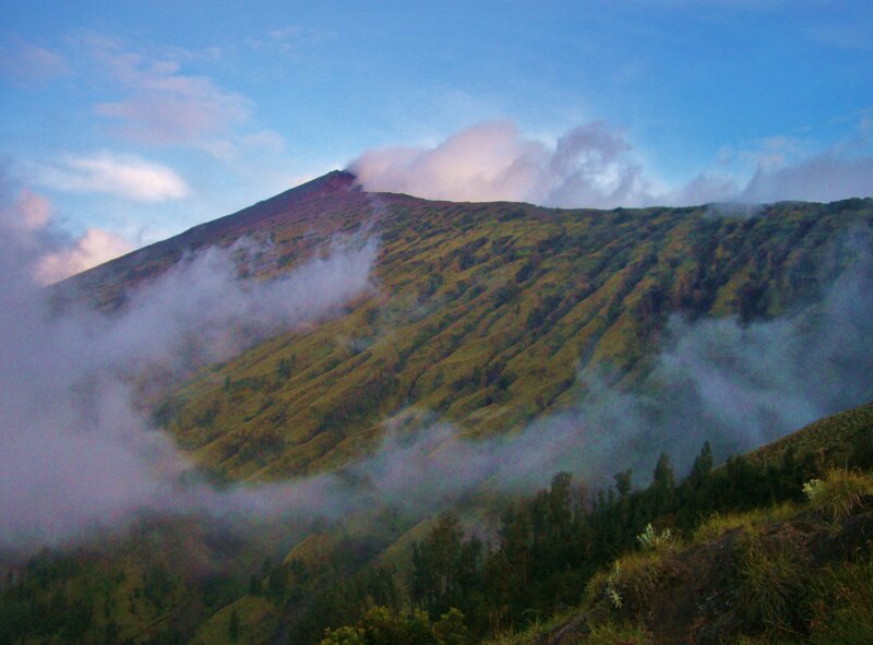 Volcano with clouds at dawn