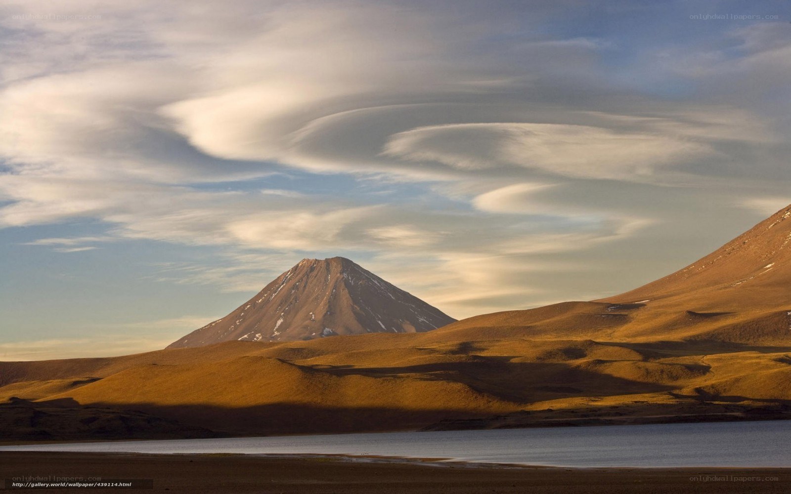 Volcano with lenticular clouds