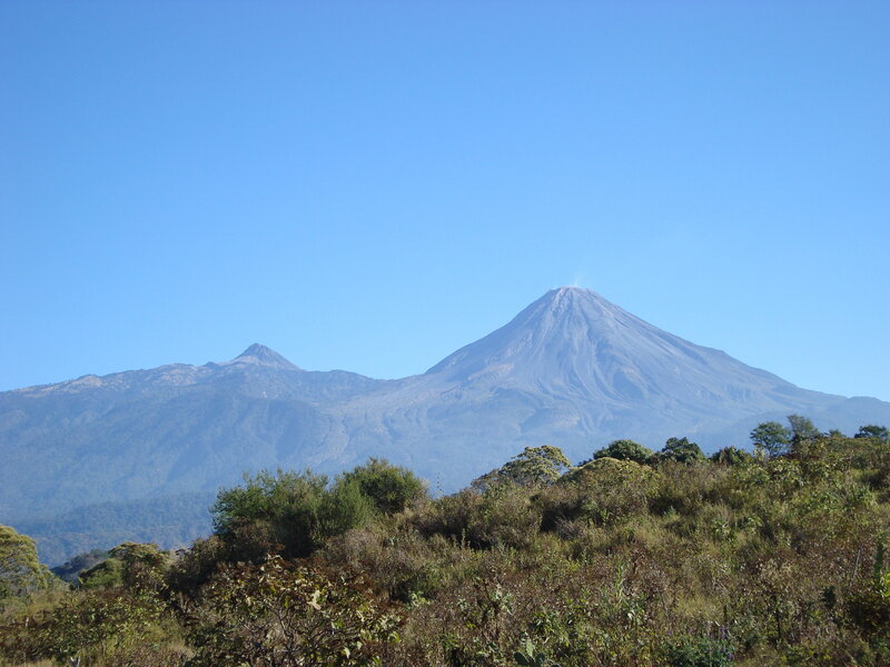volcano with smoke plume