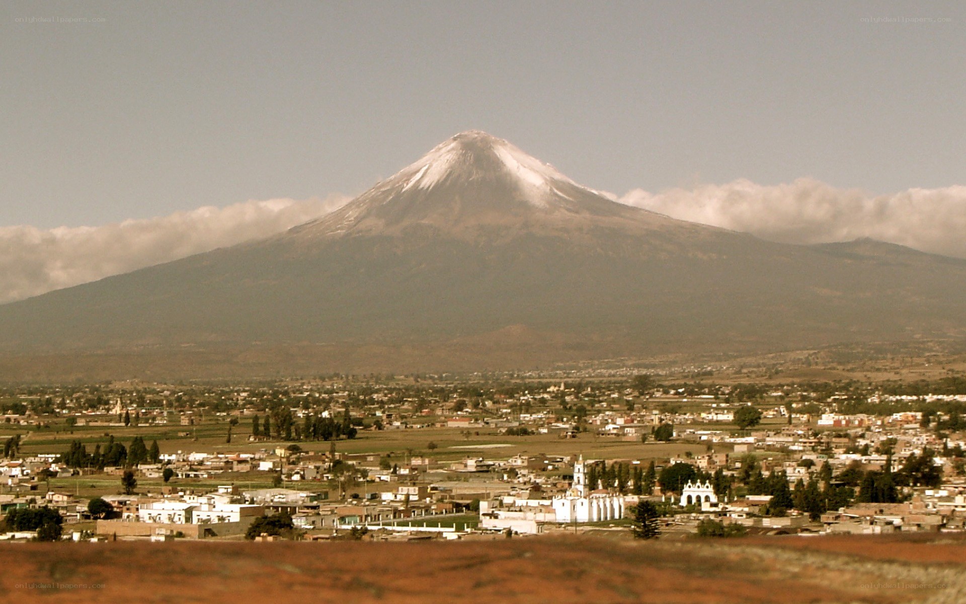 Volcano with snow-capped peak