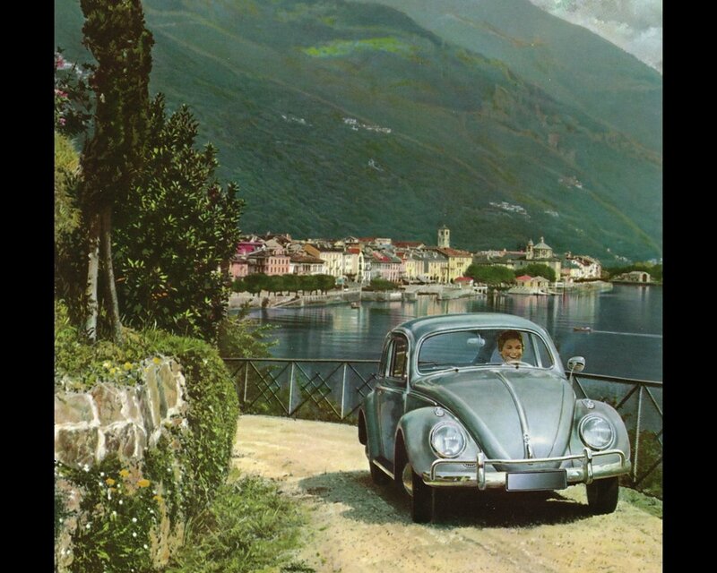 Volkswagen Beetle by a lakeside town