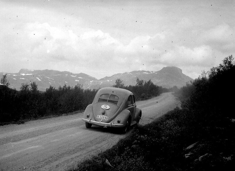 Volkswagen Beetle on Dirt Road