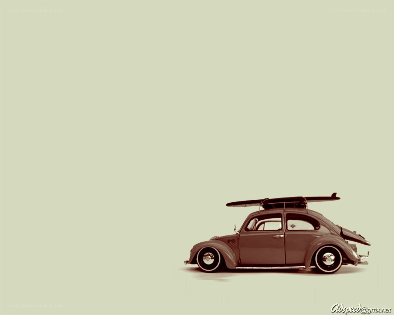Volkswagen Beetle with surfboard